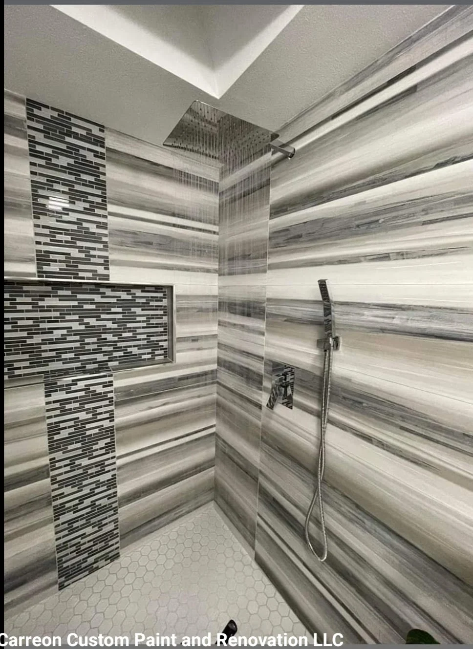 Custom bathroom remodel in Renton, WA, with cross-shaped tile, mosaic tile accents, and a curbless shower.