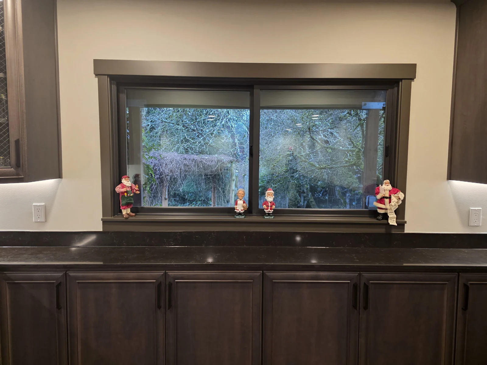 Kitchen detail with dark-framed windows.