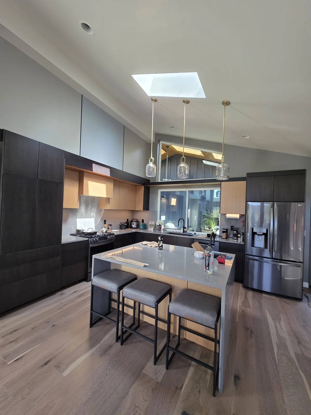 Open kitchen with clear sightlines into adjoining living space