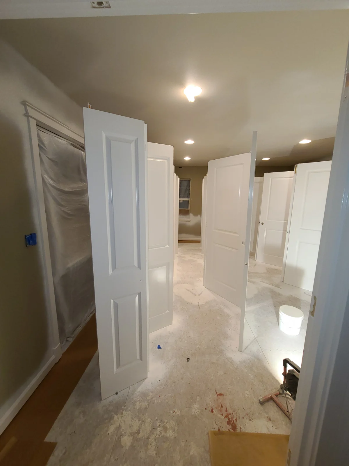 nterior doors finished in Benjamin Moore Satin Impervo oil-based paint in Chantilly Lace for a durable custom finish
